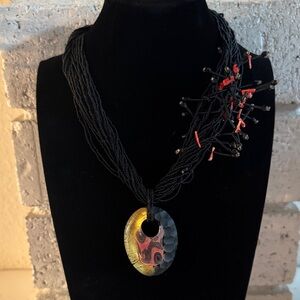 Beaded Artisan Necklace with Art Glass Pendant and Coral Accents